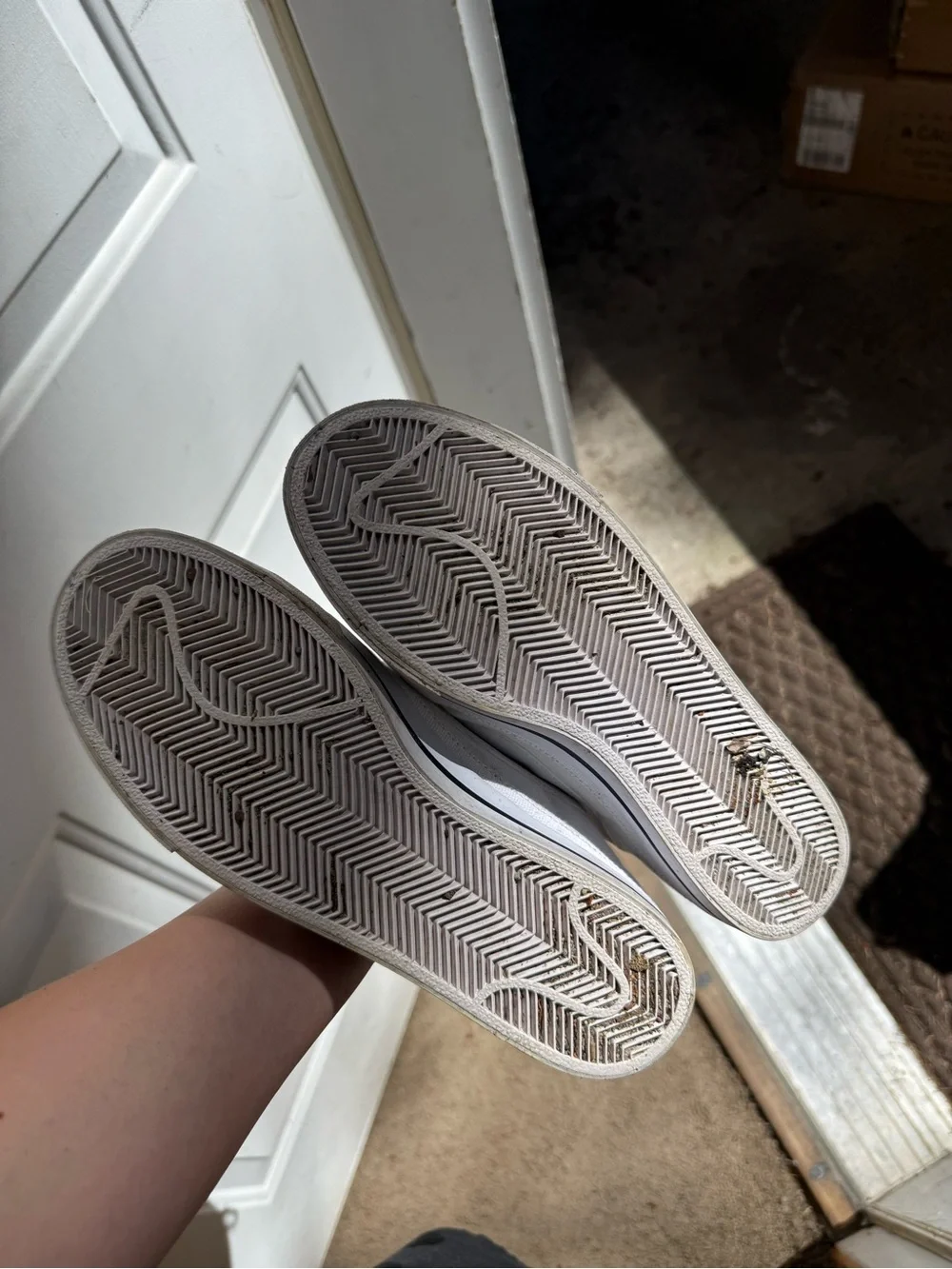 Nike Women’s White Canvas slip-on Sneakers